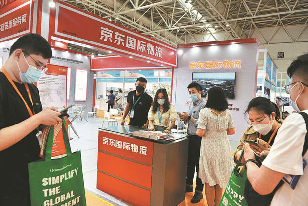JD's booth in a Chinese trade expo with young consumers